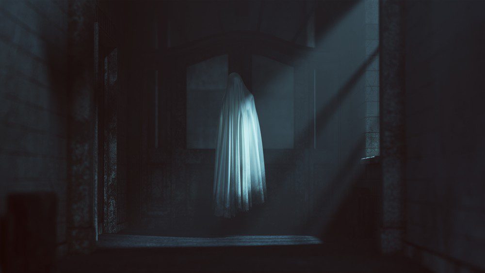 Ghost floats in a spooky doorway